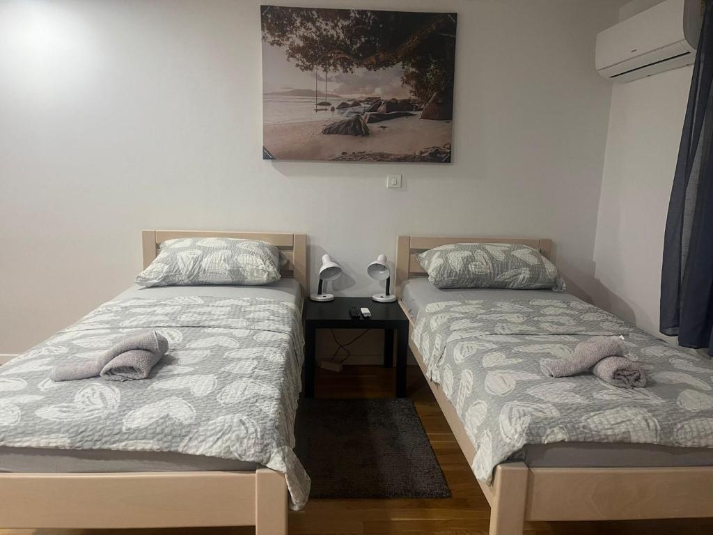 Una cama o camas en una habitación de STUDIO APARTMAN NADA