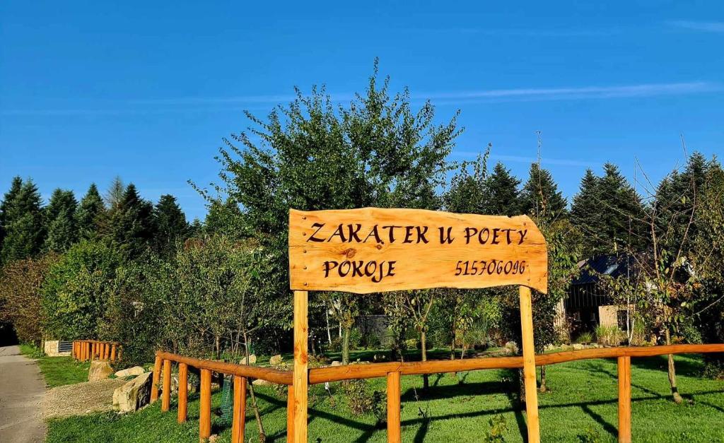 a sign that says akker iv potty promise at Zakątek u Poety Dąbrówka in Jasło