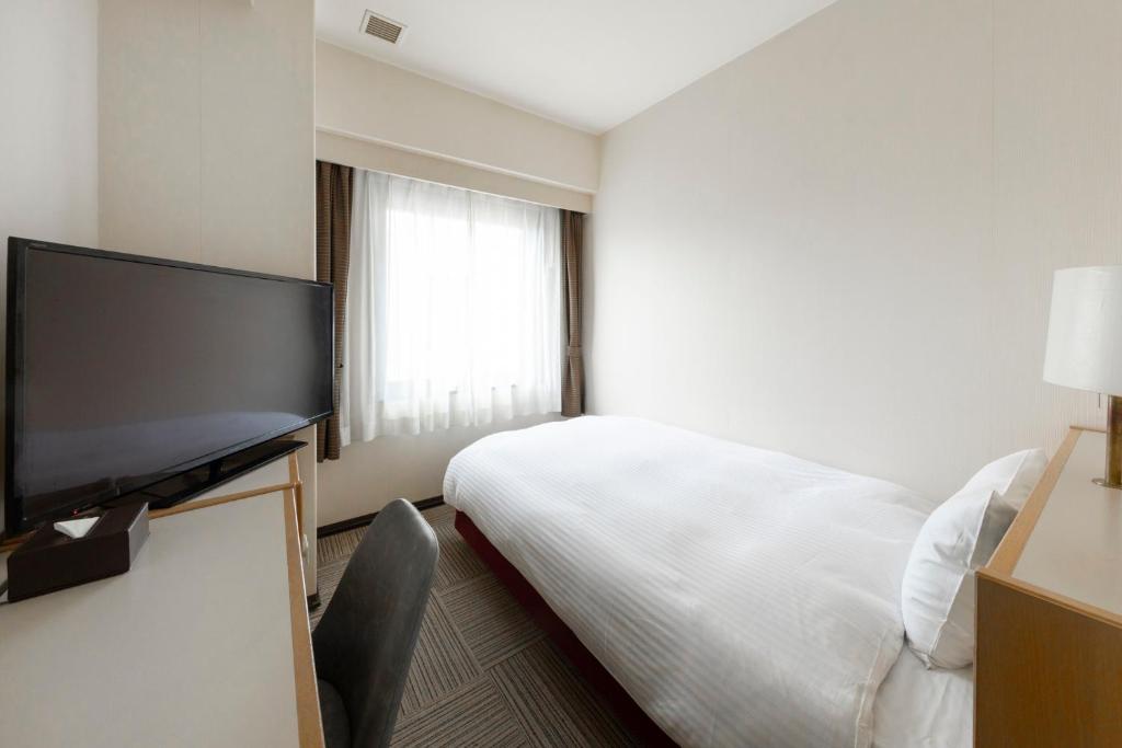 TV a/nebo společenská místnost v ubytování Court Hotel Niigata