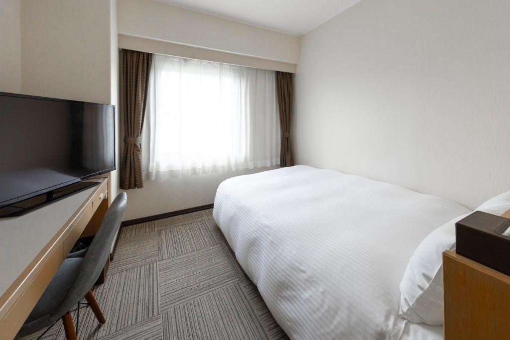 TV a/nebo společenská místnost v ubytování Court Hotel Niigata