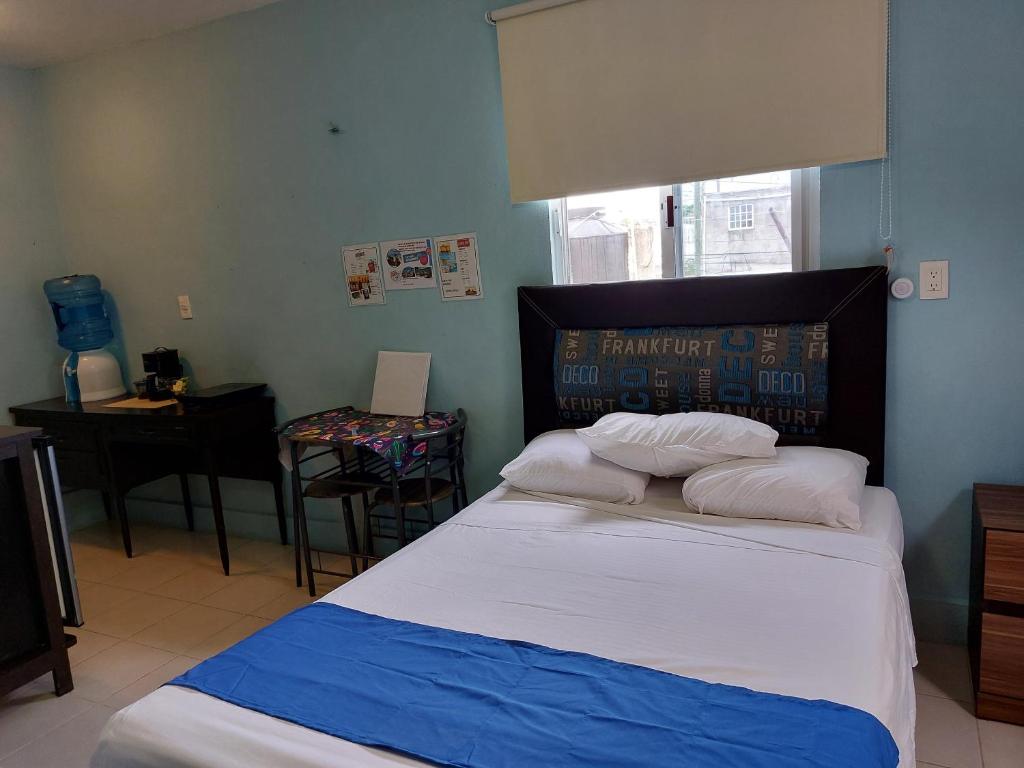 Postel nebo postele na pokoji v ubytování 4 Habitación Cozumel
