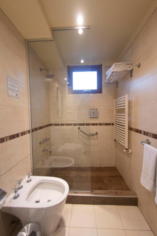 Koupelna v ubytování Del Bosque Apart Hotel
