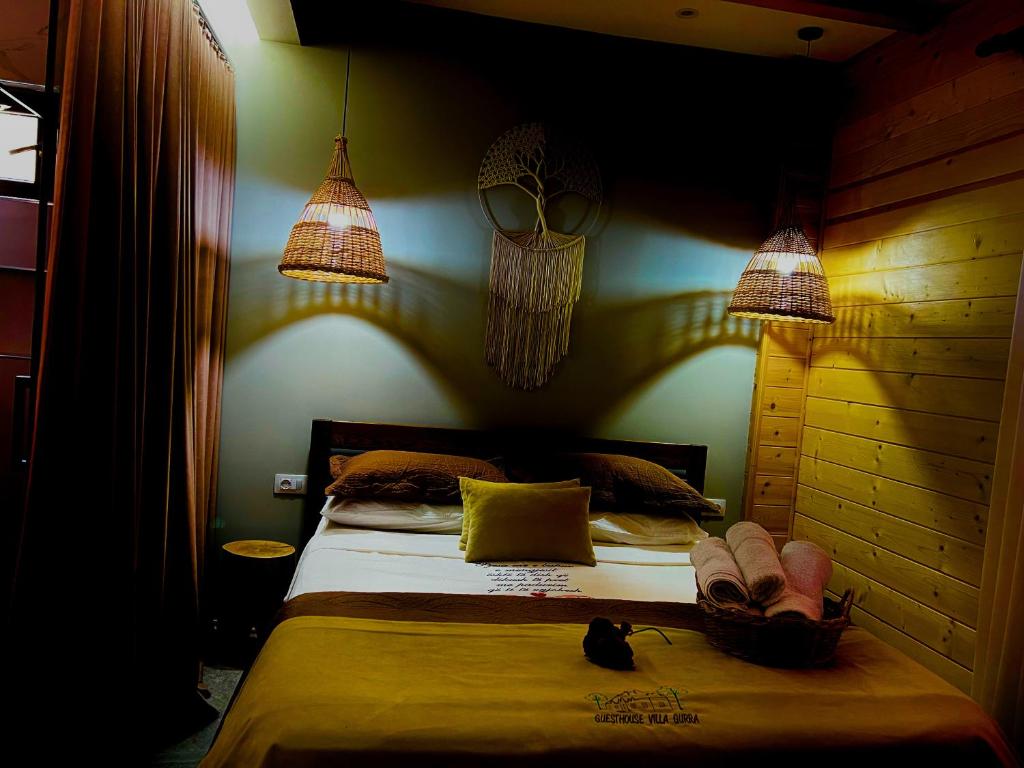 Postel nebo postele na pokoji v ubytování Guesthouse Villa Gurra