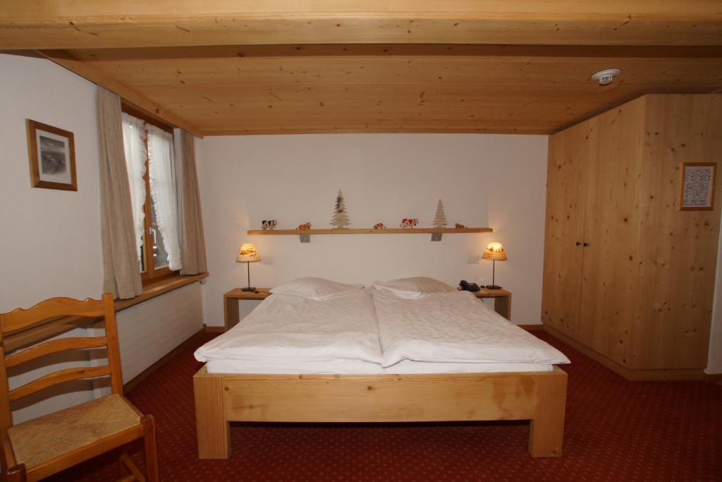 Postel nebo postele na pokoji v ubytování Posthotel Rössli