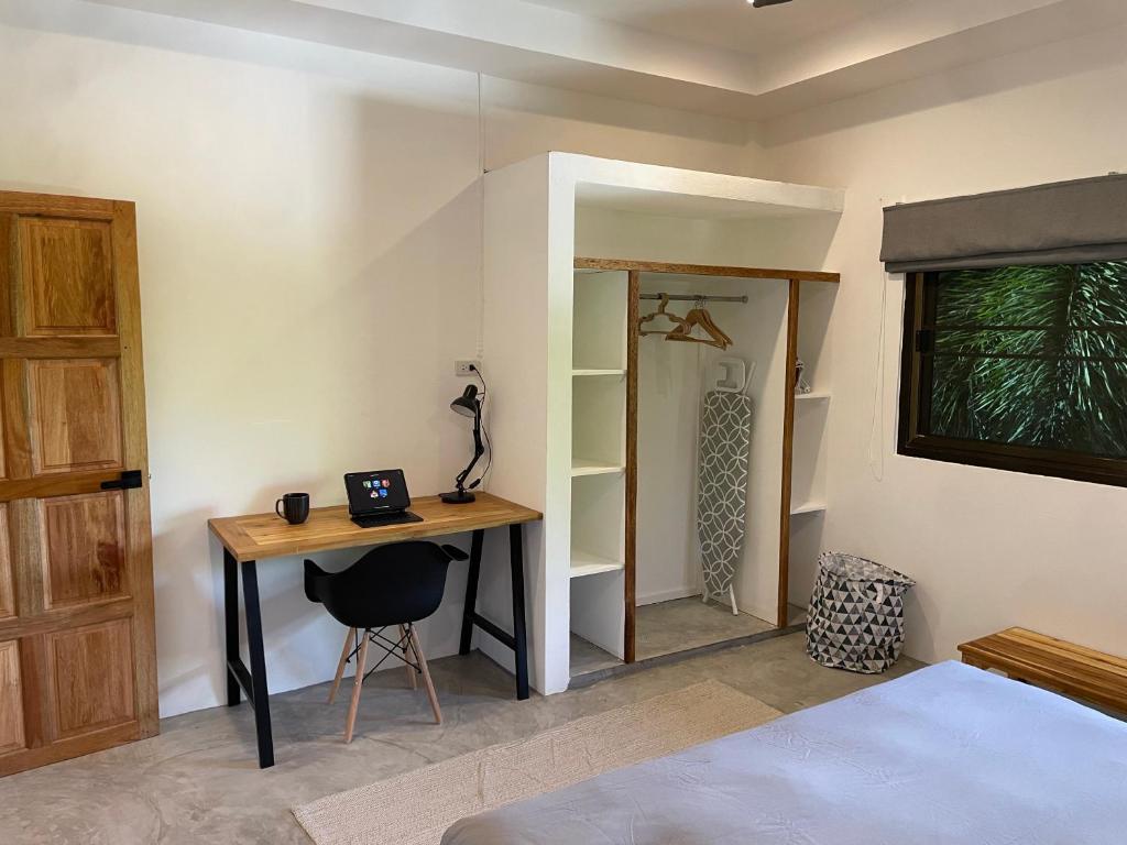 Postel nebo postele na pokoji v ubytování PATAMAAN COTTAGES