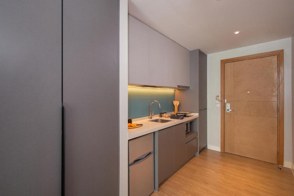 Kuchyň nebo kuchyňský kout v ubytování Citadines Roces Quezon City