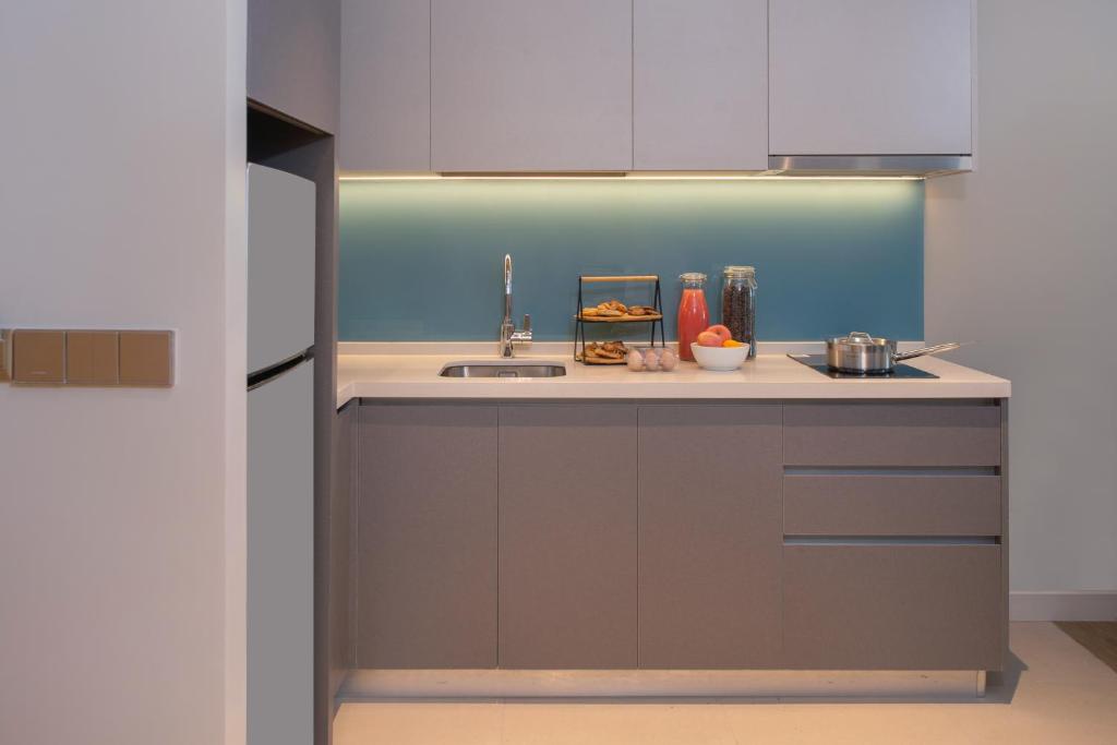 Kuchyň nebo kuchyňský kout v ubytování Citadines Roces Quezon City