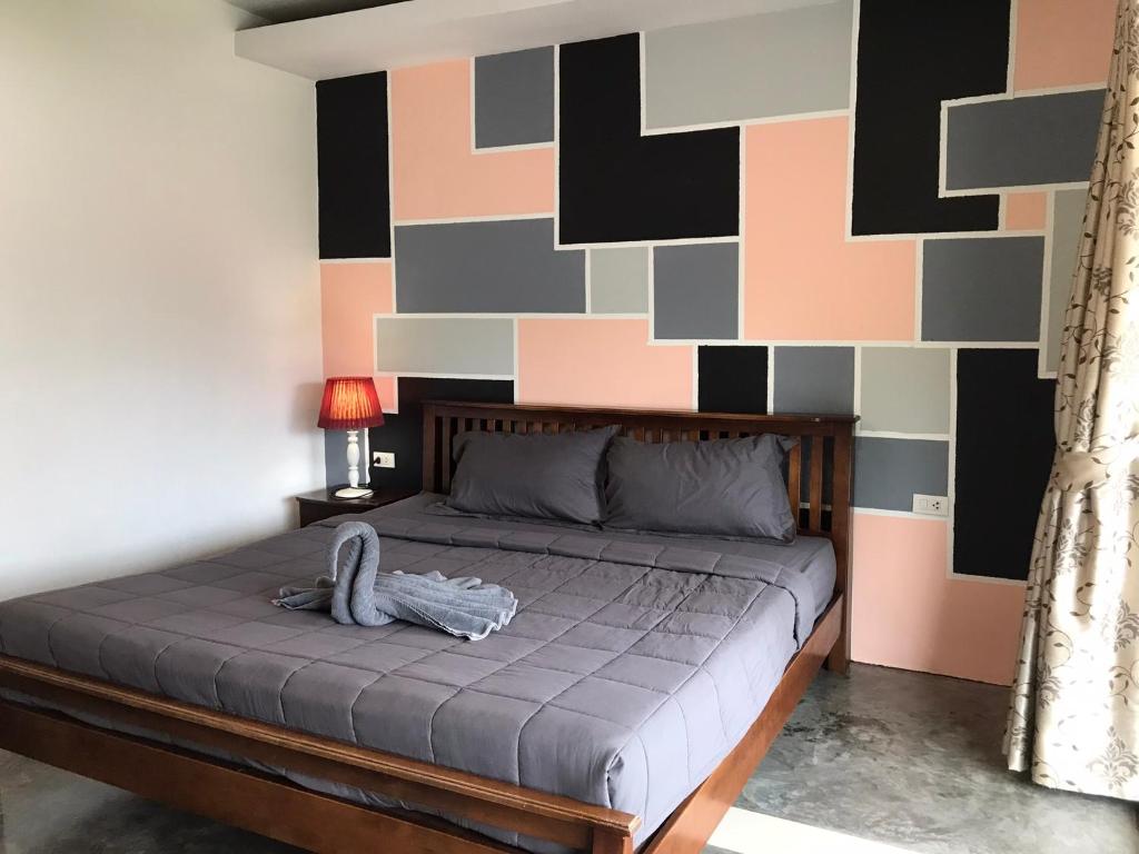 Postel nebo postele na pokoji v ubytování PP Midnight Hotel
