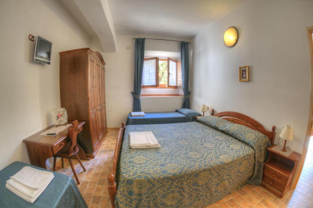 Krevet ili kreveti u jedinici u objektu Appartamenti De Sanctis