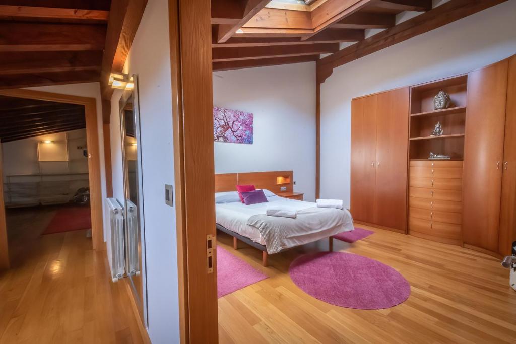 Postel nebo postele na pokoji v ubytování Oribarzar - Vivienda acogedora en plena naturaleza
