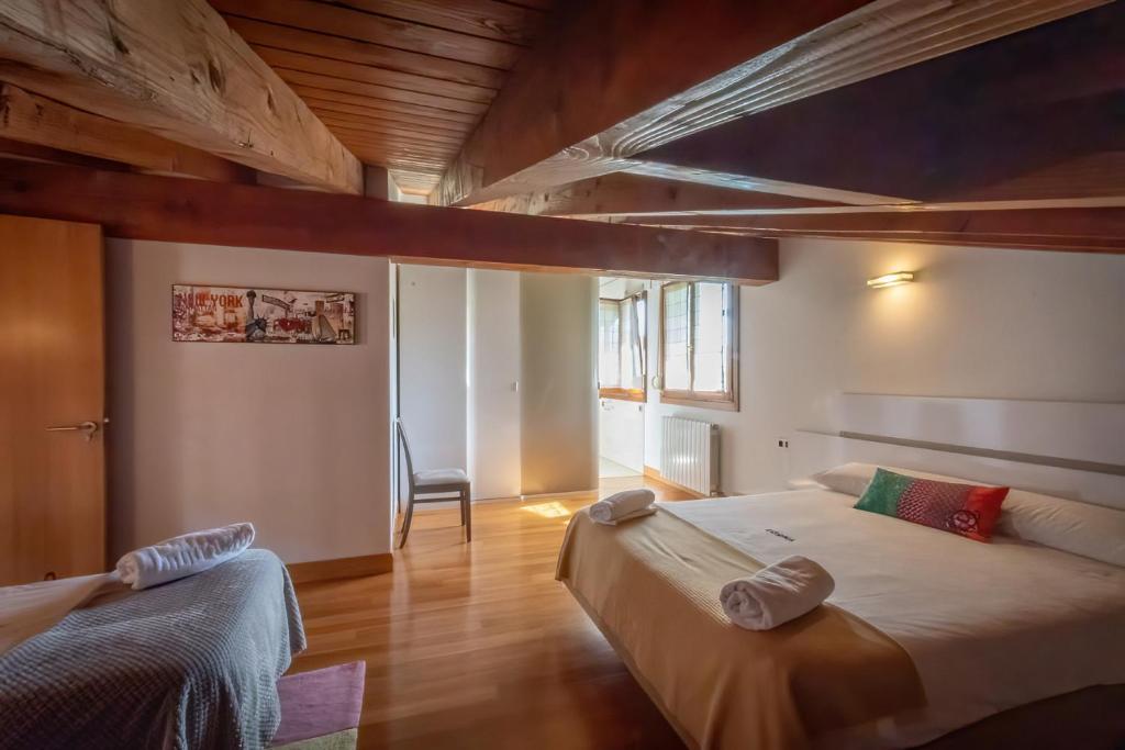 Postel nebo postele na pokoji v ubytování Oribarzar - Vivienda acogedora en plena naturaleza