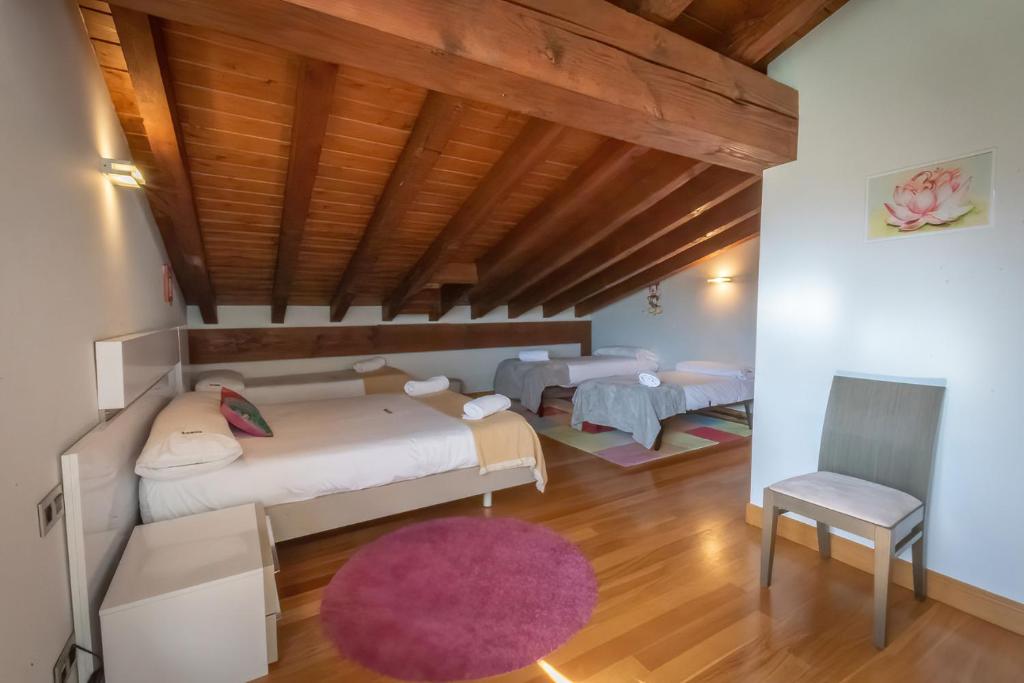 Postel nebo postele na pokoji v ubytování Oribarzar - Vivienda acogedora en plena naturaleza