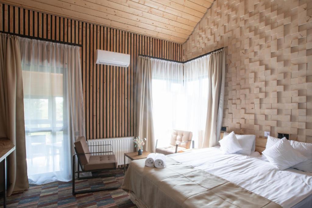 Postel nebo postele na pokoji v ubytování Ego Hotel Буковель