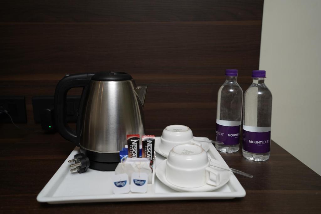 Příslušenství pro přípravu čaje a kávy v ubytování Hotel Metropolis