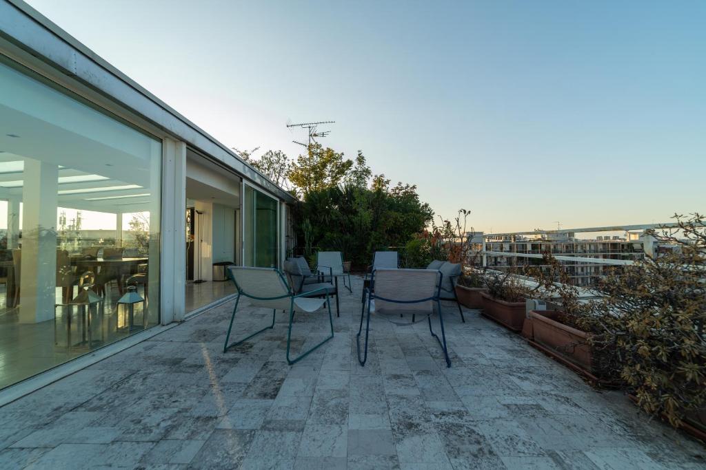 A balcony or terrace at Luxury Penthouse with Stunning View and Hammam
