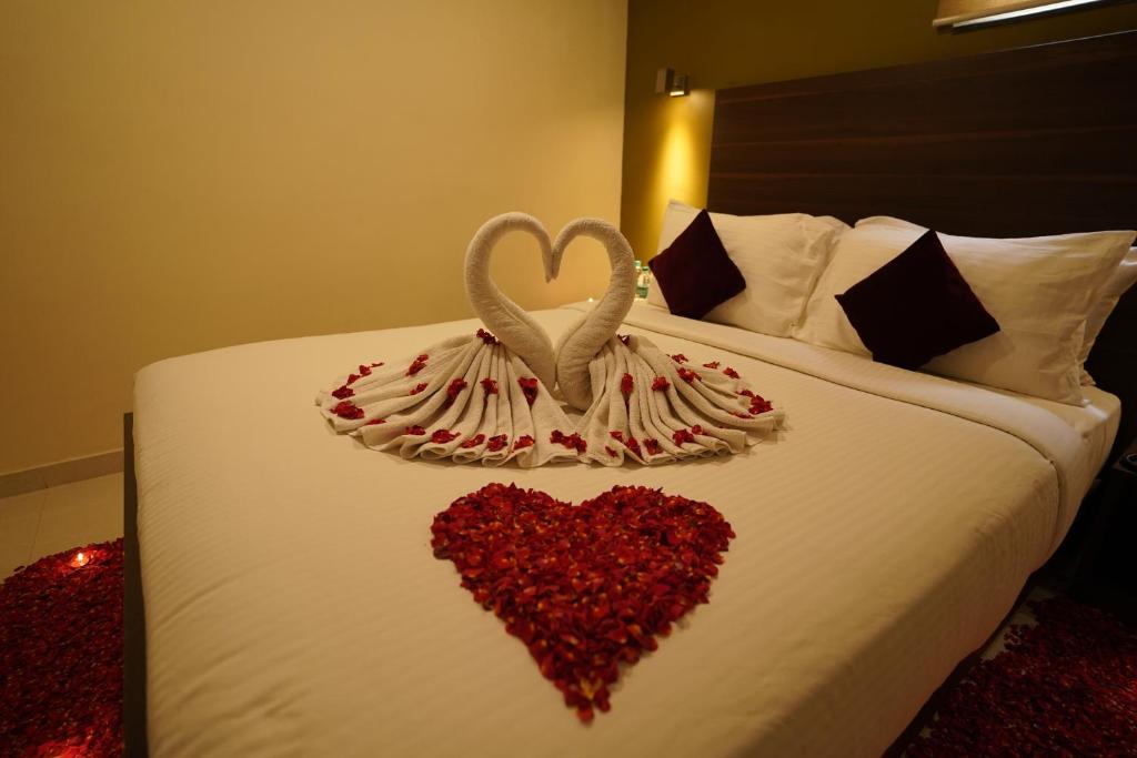 Postel nebo postele na pokoji v ubytování Hotel Metropolis