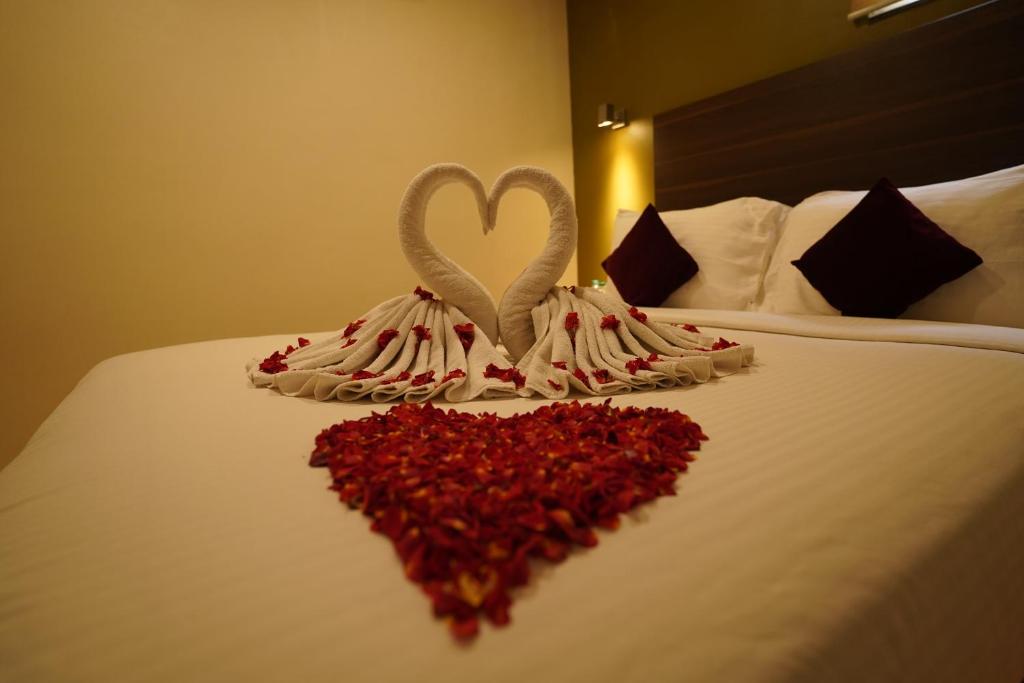 Postel nebo postele na pokoji v ubytování Hotel Metropolis