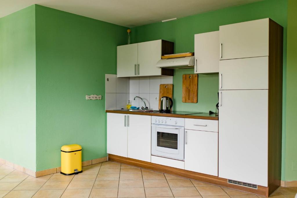 Kuchyň nebo kuchyňský kout v ubytování Tauglerei Appartement Malve in den Zauberbergen