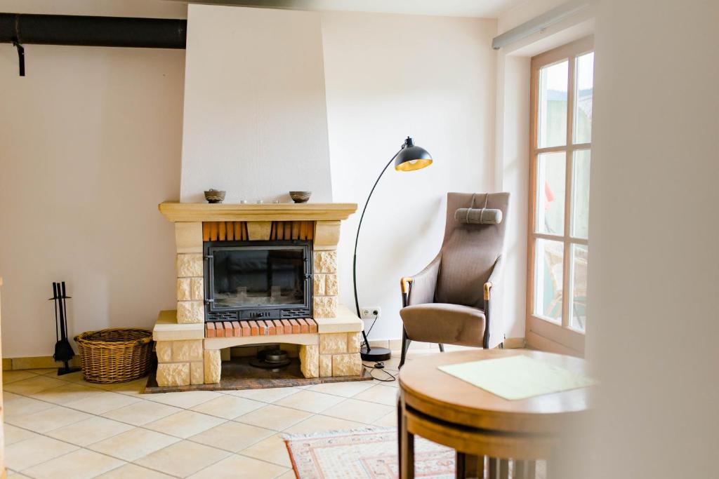 Posezení v ubytování Tauglerei Appartement Kamin in den Zauberbergen