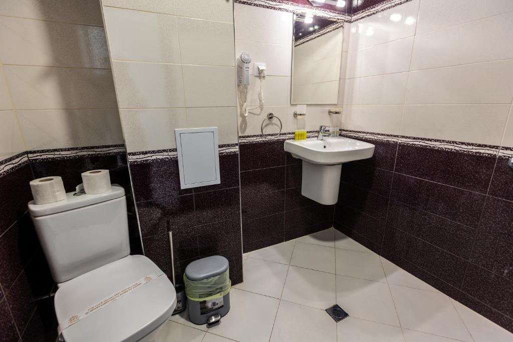 Koupelna v ubytování Hotel Nikol