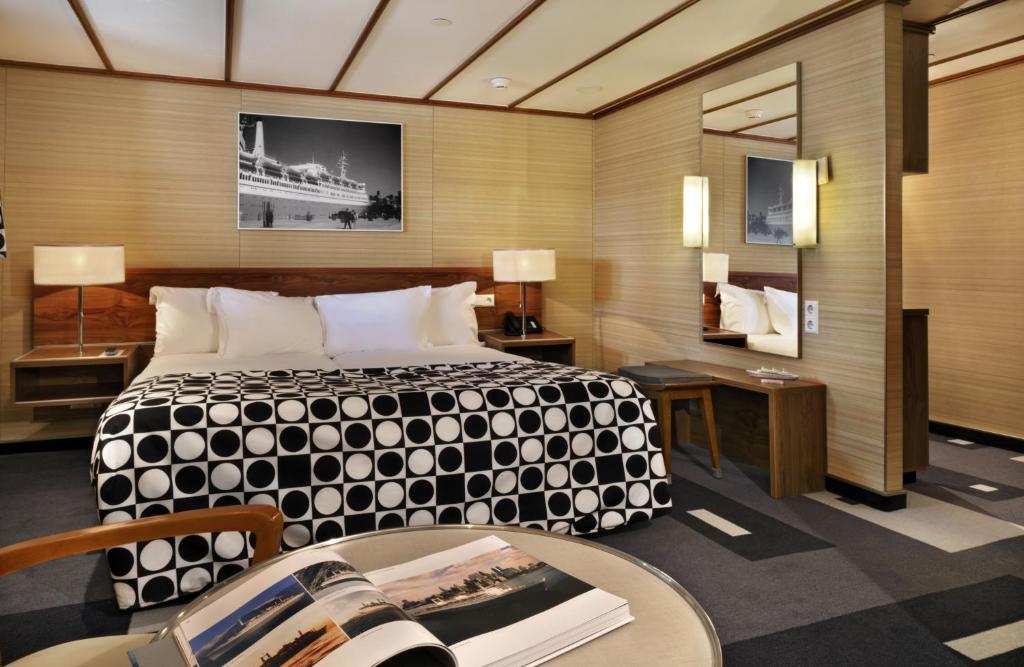 Letto o letti in una camera di ss Rotterdam by WestCord