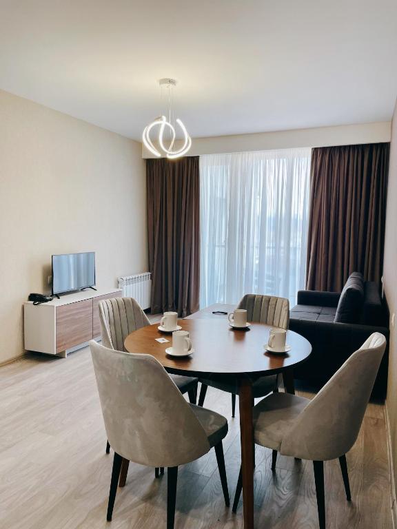 TV a/nebo společenská místnost v ubytování Crystal Loft Apartment Block A 512