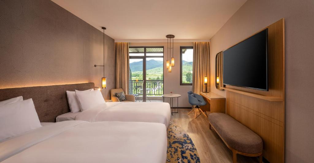 Postel nebo postele na pokoji v ubytování Hyatt Regency Pravets Resort