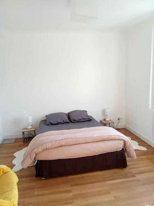 Katil atau katil-katil dalam bilik di charmante maison pr&egrave;s du centre ville