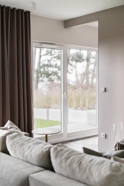 Posedenie v ubytovaní LET'S SEA - 2 Bedroom - Premium Baltic Apartment with Front Sea View Garden and SPA access