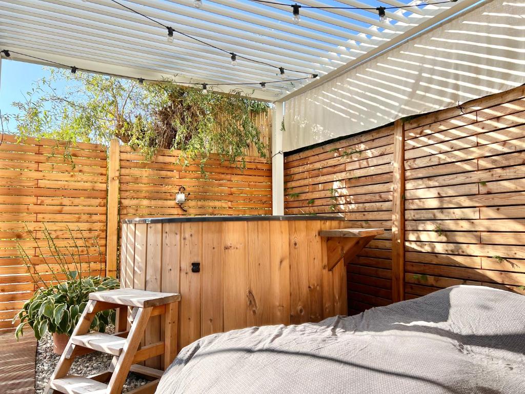 Voodi või voodid majutusasutuse Tiny House Gänseblümchen toas