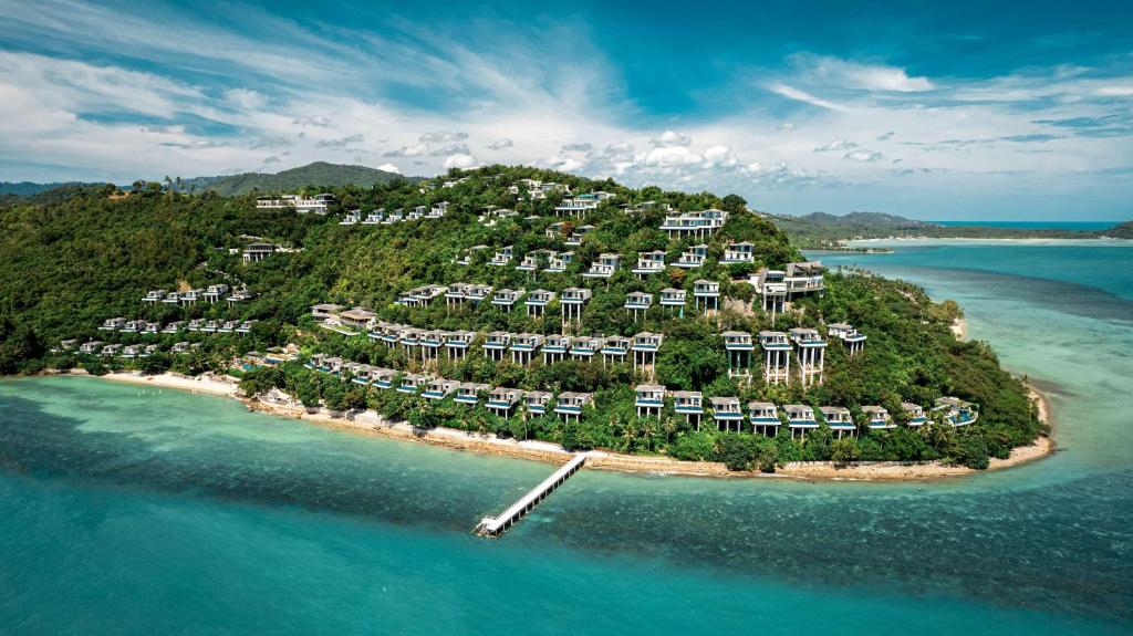 an island in the ocean with a resort at Conrad Koh Samui in Taling Ngam Beach