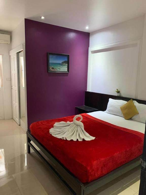 Postel nebo postele na pokoji v ubytování Colorize Boutique Hotel