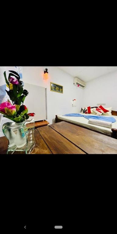 Voodi või voodid majutusasutuse Nethusaliguesthouse toas
