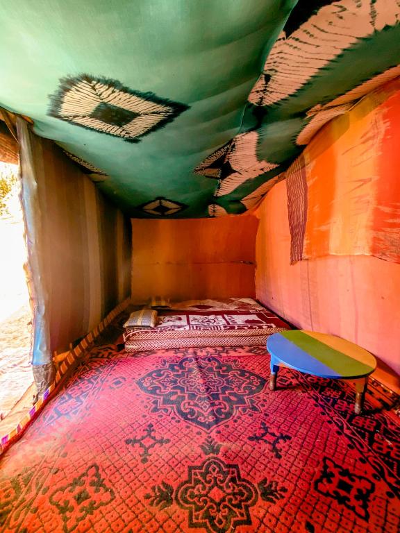 Postel nebo postele na pokoji v ubytování Oasis Desert Camp Obira