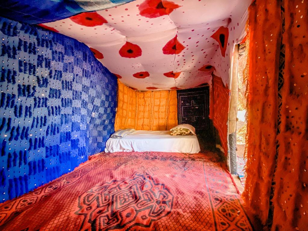 Postel nebo postele na pokoji v ubytování Oasis Desert Camp Obira