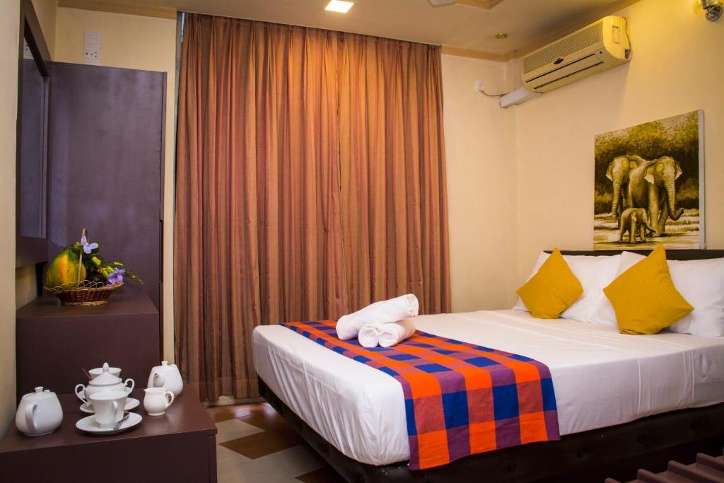 Postel nebo postele na pokoji v ubytování Hotel Lakefield