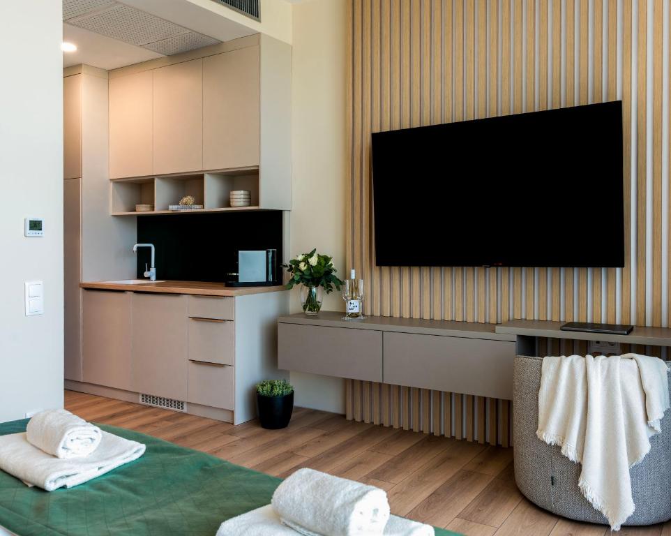 A television and/or entertainment centre at Zala Springs Golf Resort