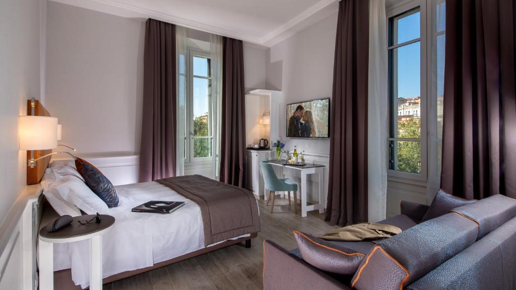 Postel nebo postele na pokoji v ubytování Princeps Boutique Hotel