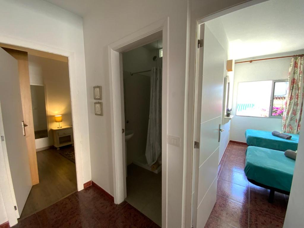 Posteľ alebo postele v izbe v ubytovaní Casa Castillo
