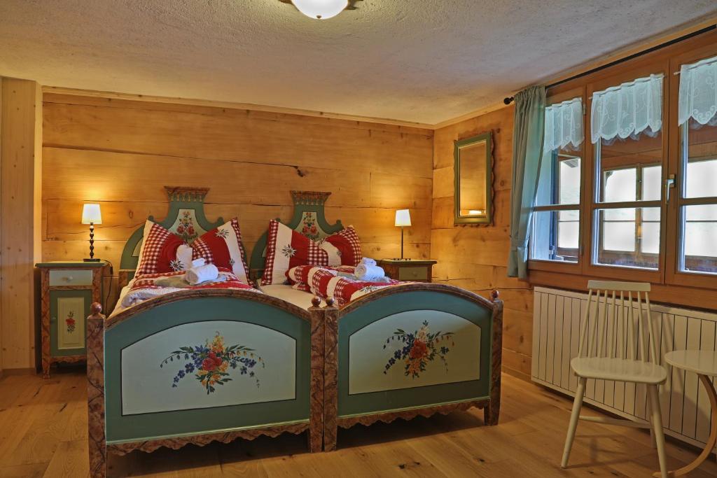 Postel nebo postele na pokoji v ubytování Gasthaus Bellawiese