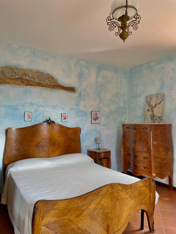 Łóżko lub łóżka w pokoju w obiekcie Agriturismo Piano di Andrea