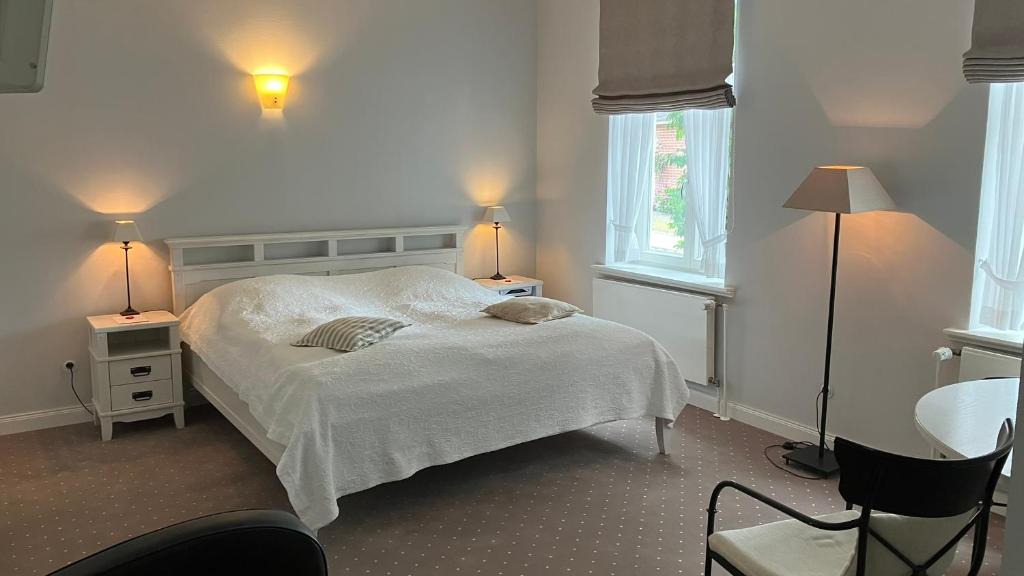 Postel nebo postele na pokoji v ubytování Hotel Seemöwe