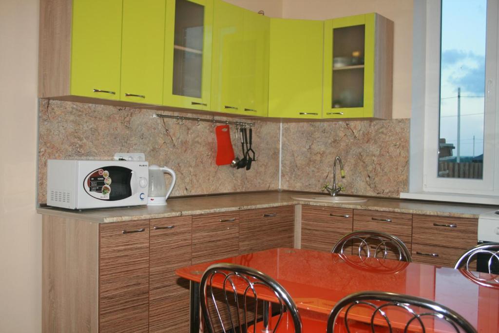 A cozinha ou kitchenette de Guesthouse Tomskaya