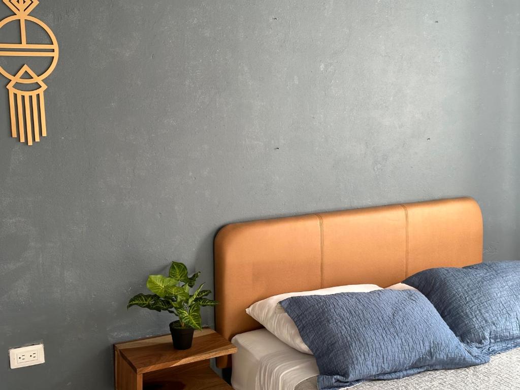 Postel nebo postele na pokoji v ubytování Hotel Casa Lucca