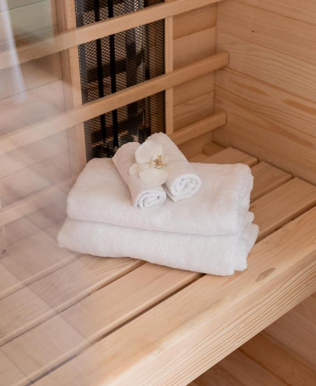 A bed or beds in a room at Zala Springs Golf Resort