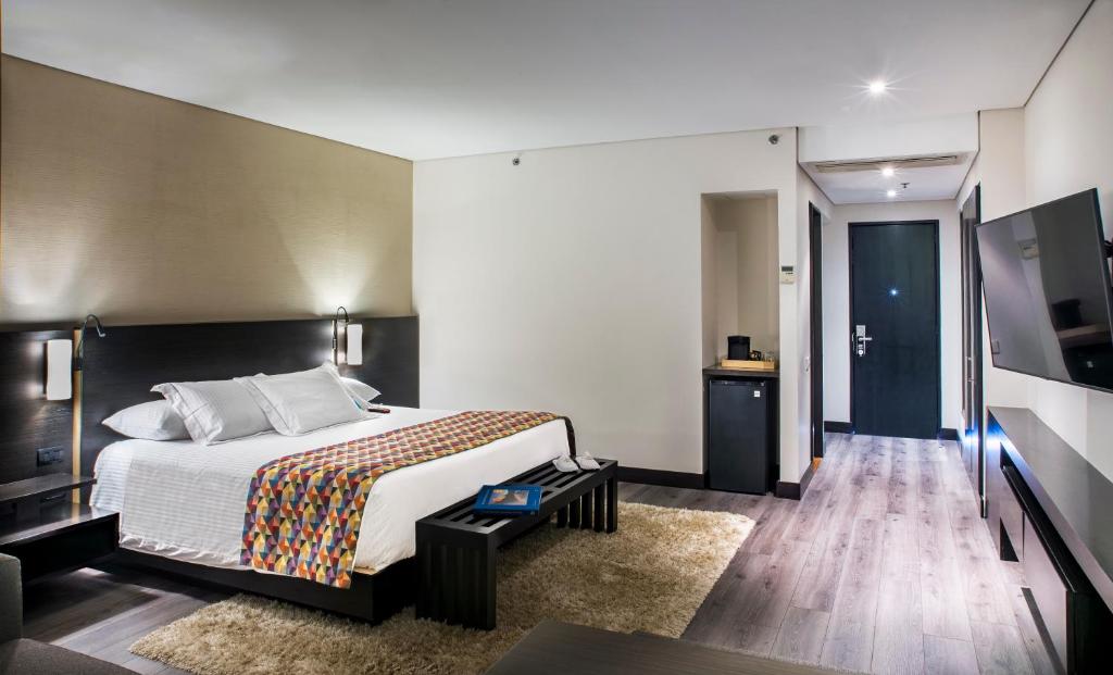 Postel nebo postele na pokoji v ubytování Cité Hotel