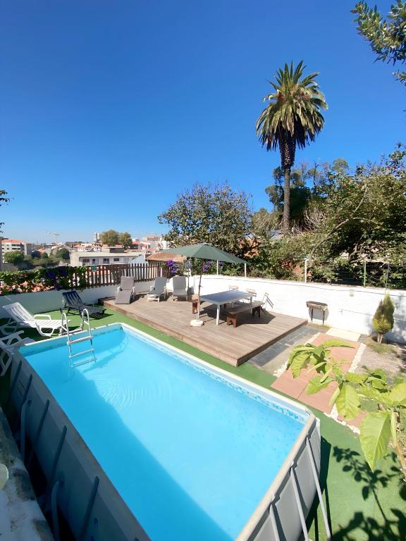 a large swimming pool on top of a building at Douro sunset lounge in Porto