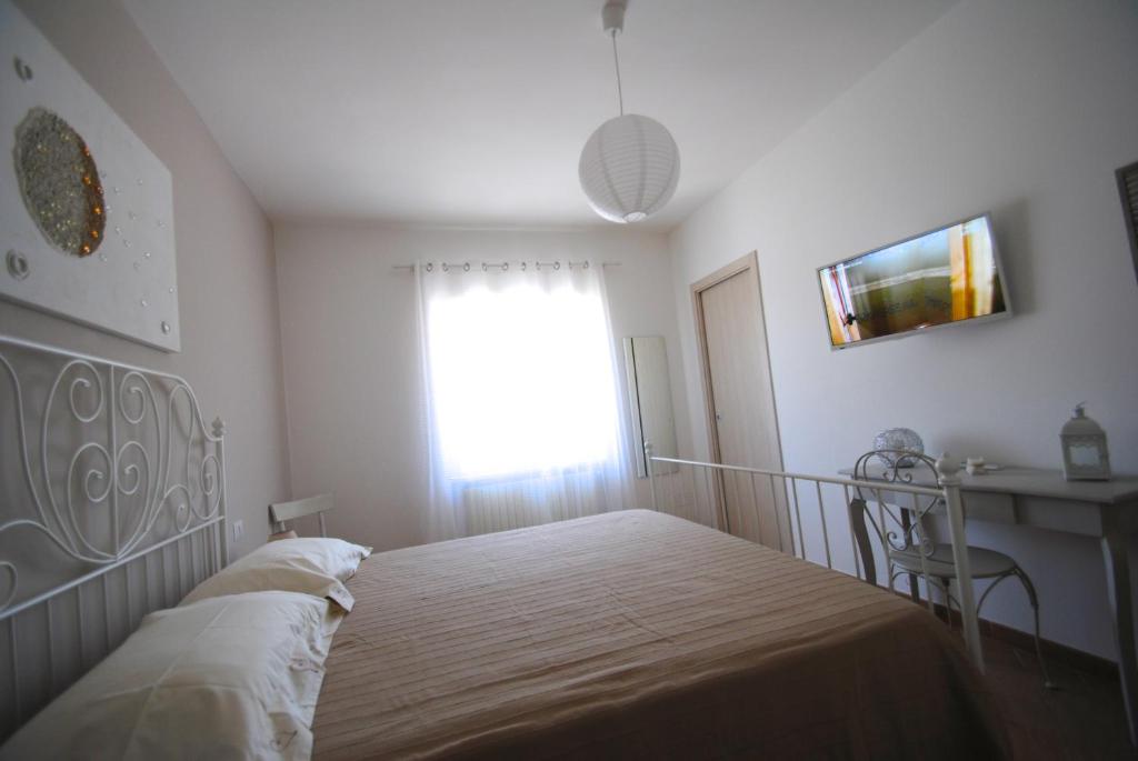 Postel nebo postele na pokoji v ubytování B&B Puglia Vista Mare
