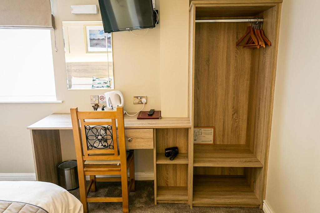 TV a/nebo společenská místnost v ubytování Tralee Townhouse