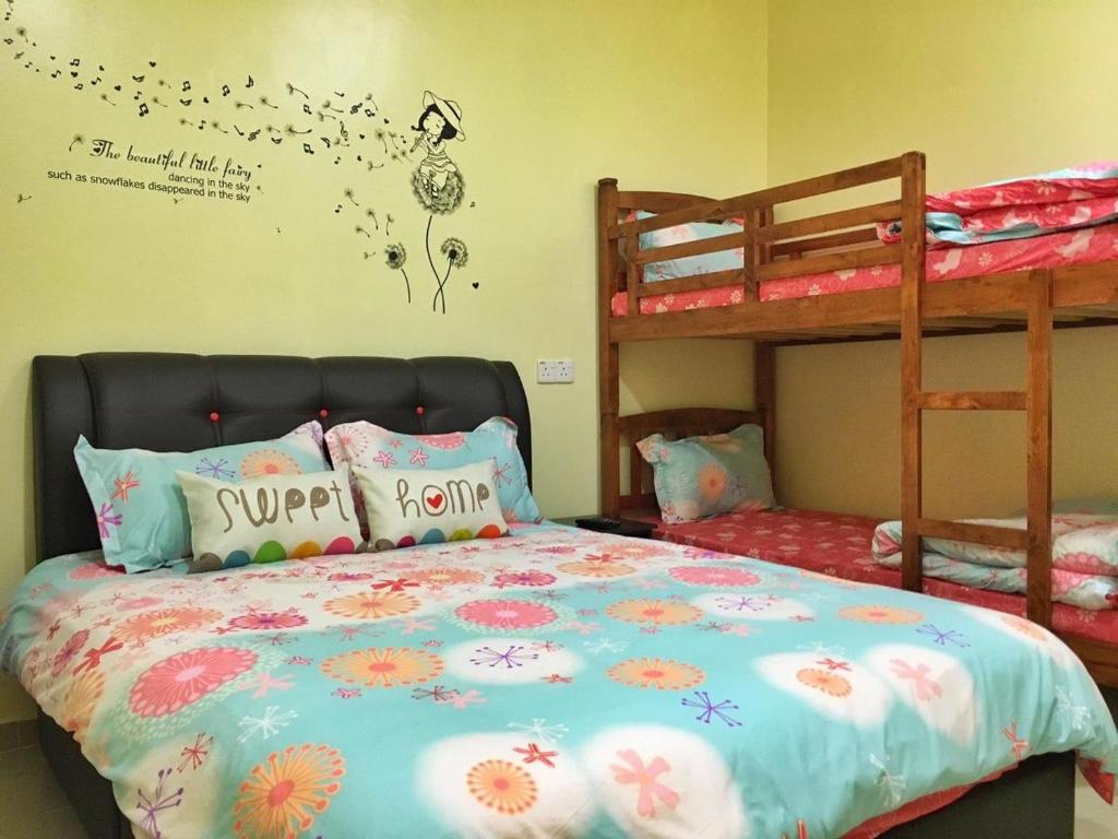 Krevet ili kreveti na kat u jedinici u objektu 幸福园 Little Happiness Homestay Pulau Ketam
